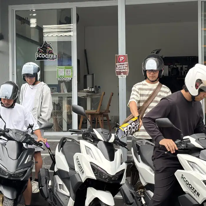 a group of friends renting some honda click 160 bikes from scooter hub