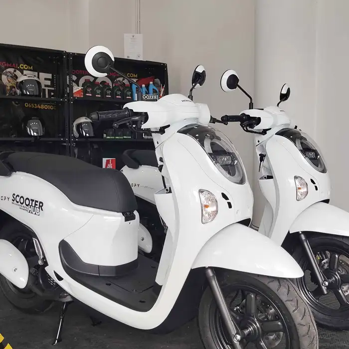 two honda scoopys at the scooter hub office